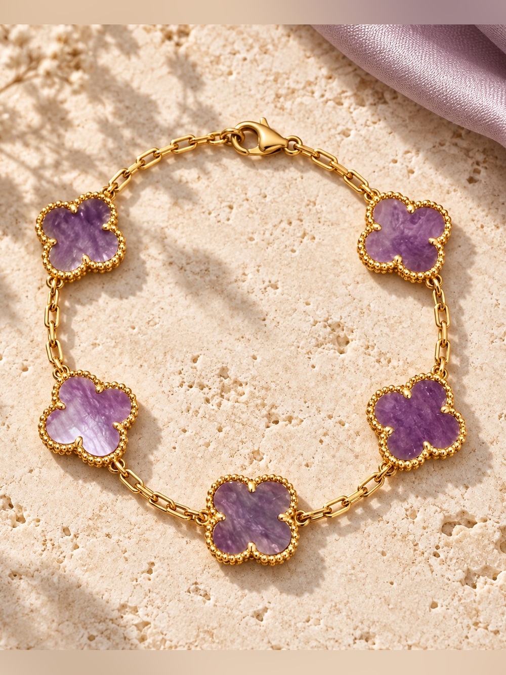 Gold Bracelet with Purple Clover Accents